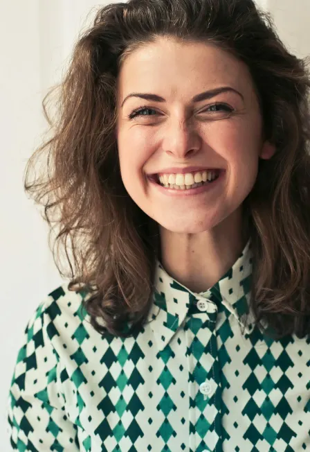 Two people holding hands symbolizing support and unity